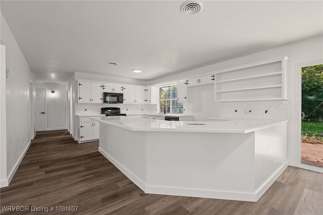 123 Oak St, Alma, AR 72921 - kitchen featuring black appliances, dark wood finished floors, open shelves, white cabinetry, and recessed lighting
