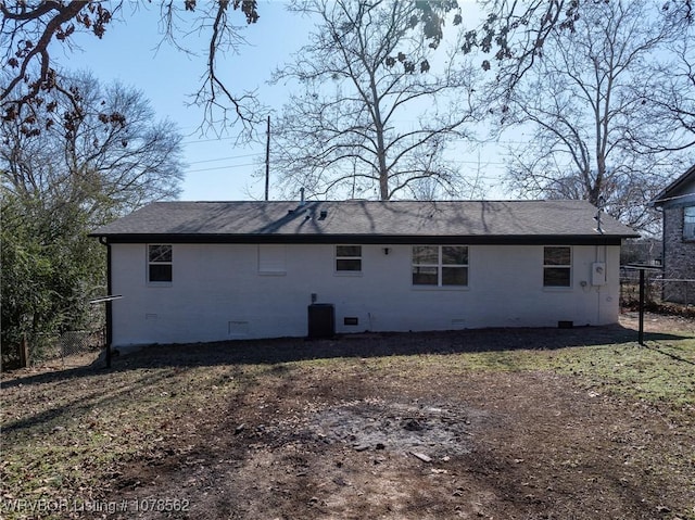 rear view of property with central air condition unit