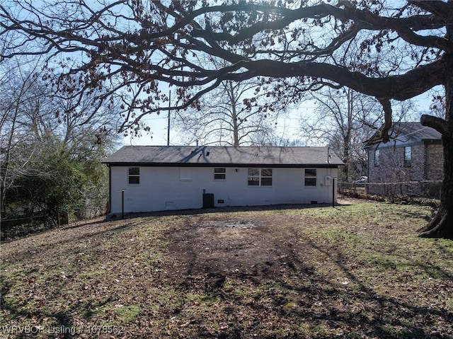 back of property featuring cooling unit