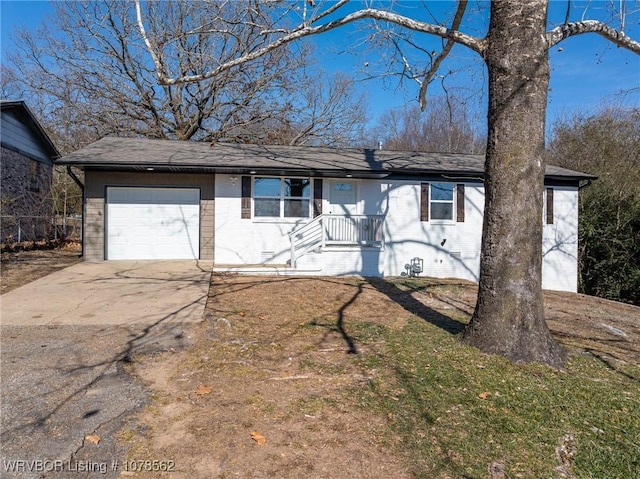 ranch-style home with a garage