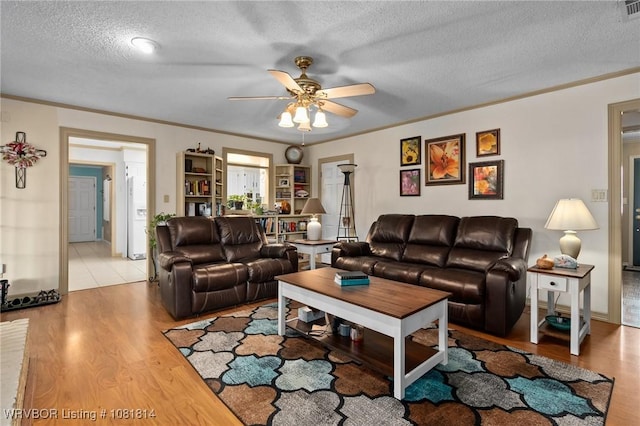 2508 Roxbury Ln, Fort Smith, AR 72908 - living area featuring ceiling fan, a textured ceiling, wood finished floors, and crown molding