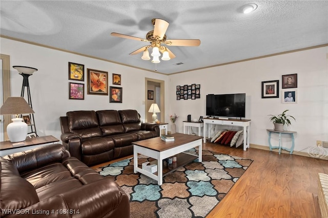 2508 Roxbury Ln, Fort Smith, AR 72908 - living room featuring ceiling fan, wood finished floors, crown molding, and a textured ceiling