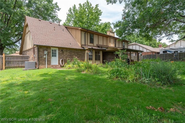 2508 Roxbury Ln, Fort Smith, AR 72908 - rear view of property with a chimney, a shingled roof, and brick siding