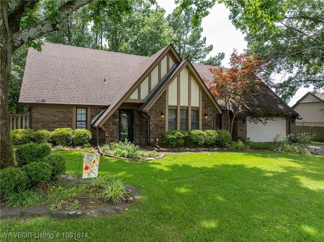 2508 Roxbury Ln, Fort Smith, AR 72908 - tudor-style house featuring stucco siding, stone siding, roof with shingles, and an attached garage