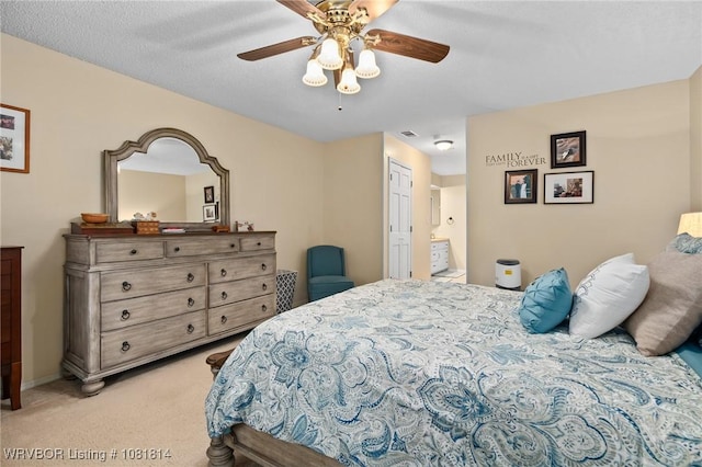 2508 Roxbury Ln, Fort Smith, AR 72908 - bedroom featuring light colored carpet, connected bathroom, and ceiling fan
