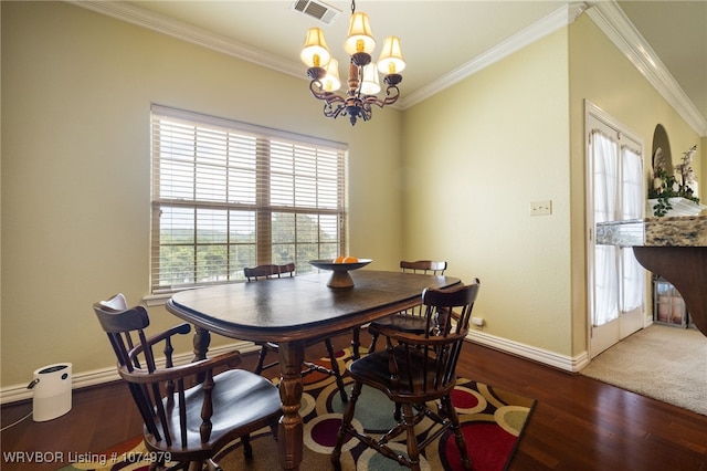 dining area featuring crown molding, a notable chandelier, and dark hardwood / wood-style flooring