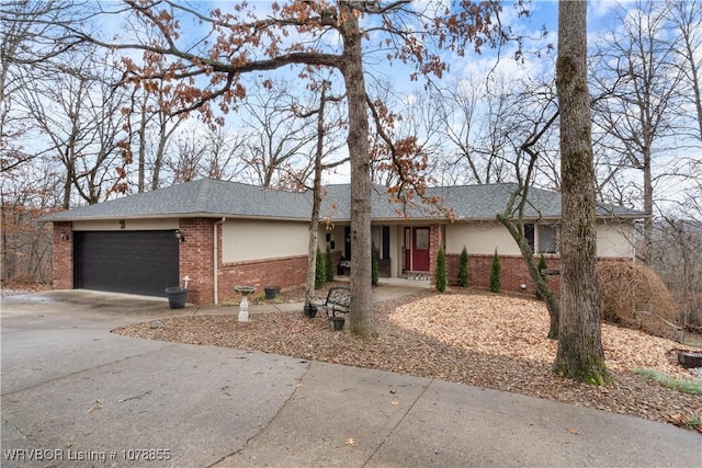 single story home featuring a garage