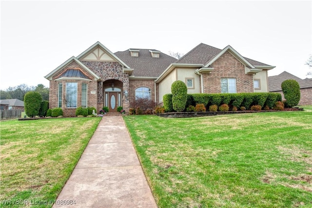 1101 Eagle Crest Dr, Alma, AR 72921 - view of front of home featuring a front lawn, brick siding, and roof with shingles