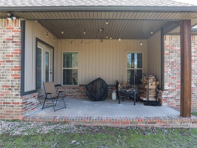 view of patio featuring a grill