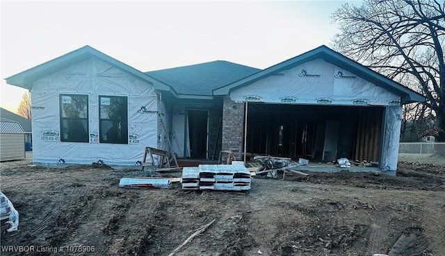 property under construction with an attached garage