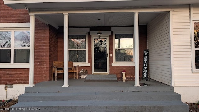 doorway to property with covered porch