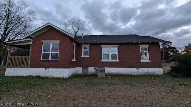 view of side of property with cooling unit