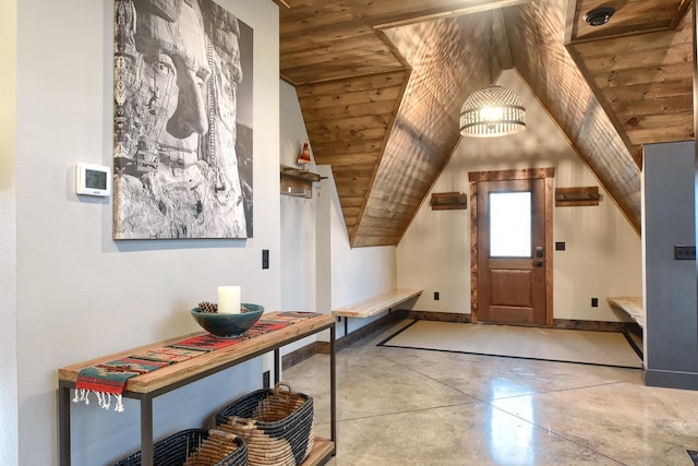 foyer with lofted ceiling and wood ceiling