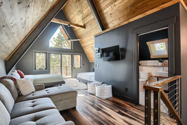 living room with beam ceiling, dark hardwood / wood-style flooring, wood ceiling, and a skylight