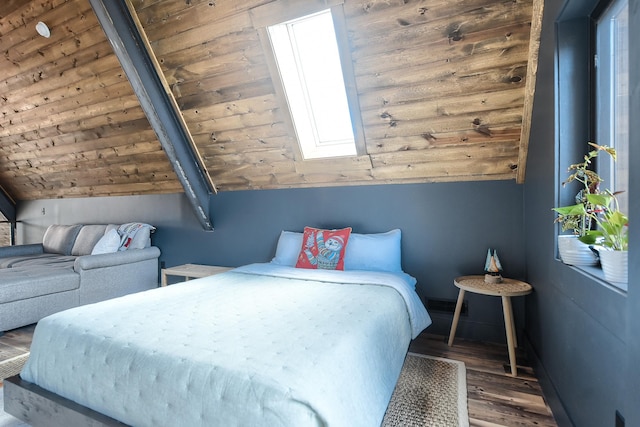 bedroom featuring dark hardwood / wood-style floors, lofted ceiling with skylight, and wooden ceiling