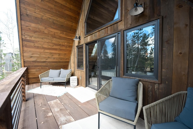 wooden deck featuring an outdoor hangout area