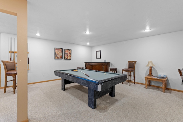 game room with billiards and light carpet