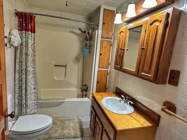 full bathroom with backsplash, tile walls, toilet, shower / bath combination with curtain, and oversized vanity