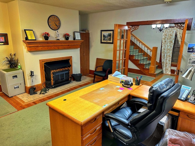 office area with an inviting chandelier