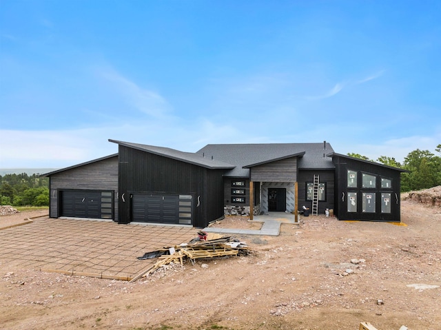 view of front of home with an attached garage and driveway