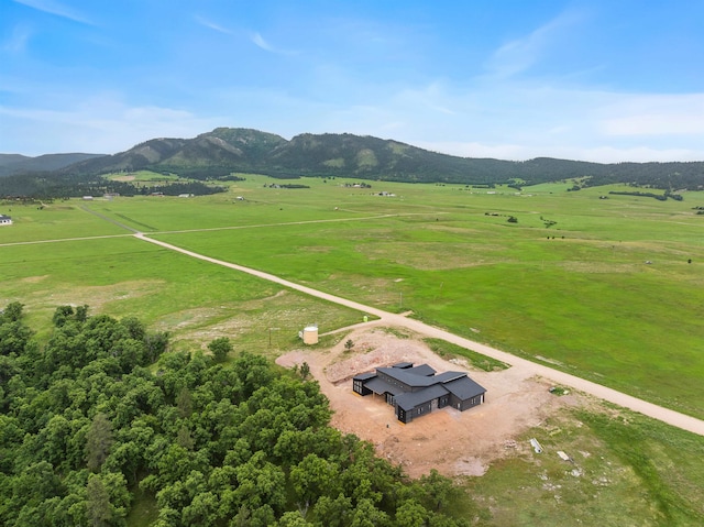 aerial view with a mountain view and a rural view