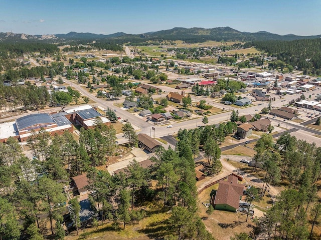 drone / aerial view featuring a mountain view