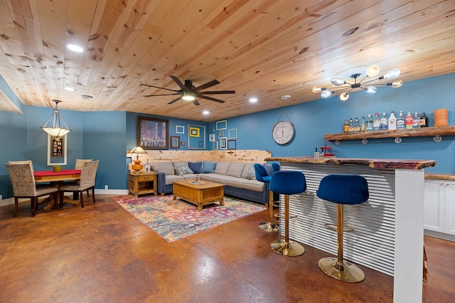 living room featuring wood ceiling, ceiling fan, and bar