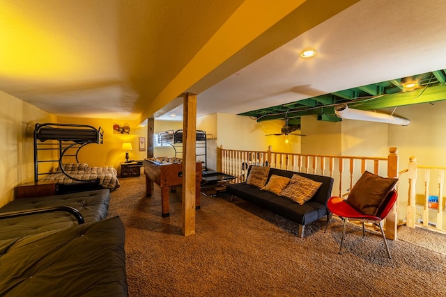 carpeted living room featuring ceiling fan