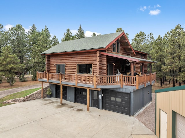 log-style house with a deck