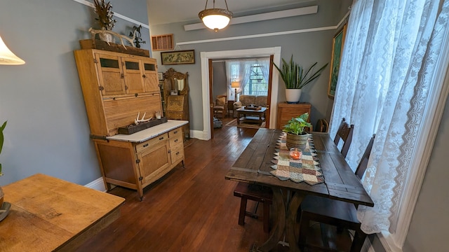 dining room featuring dark hardwood / wood-style floors