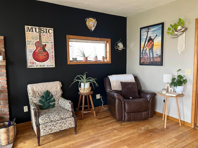 living area with light hardwood / wood-style floors