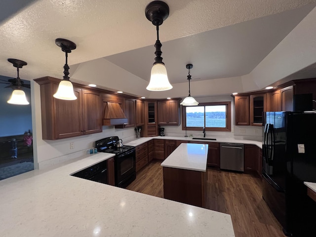kitchen featuring custom exhaust hood, glass insert cabinets, dark wood-type flooring, a sink, and black appliances