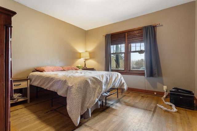 bedroom featuring hardwood / wood-style floors