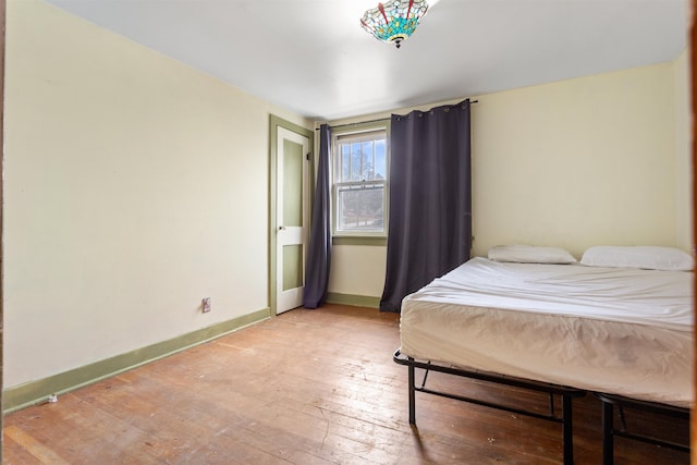 bedroom featuring wood-type flooring