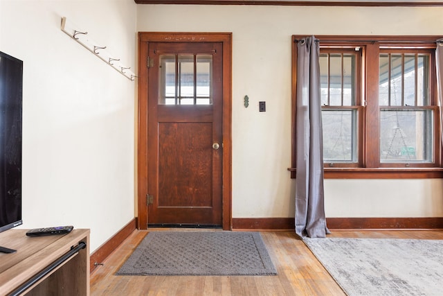 foyer featuring light hardwood / wood-style flooring and a wealth of natural light