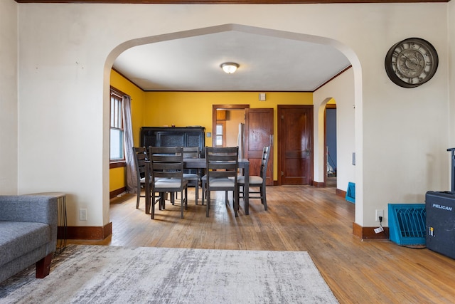 dining area featuring wood-type flooring