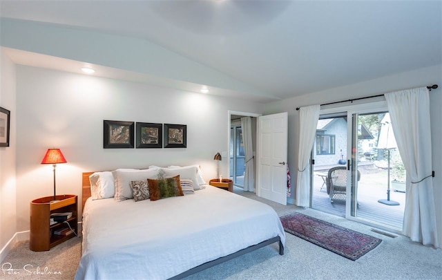 carpeted bedroom with lofted ceiling and access to exterior