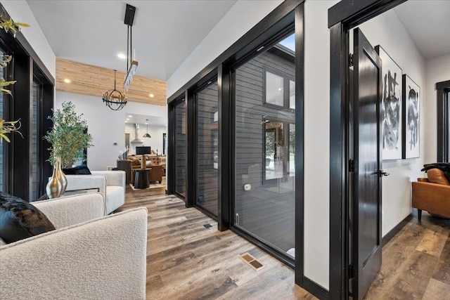 interior space with visible vents, wood finished floors, and recessed lighting