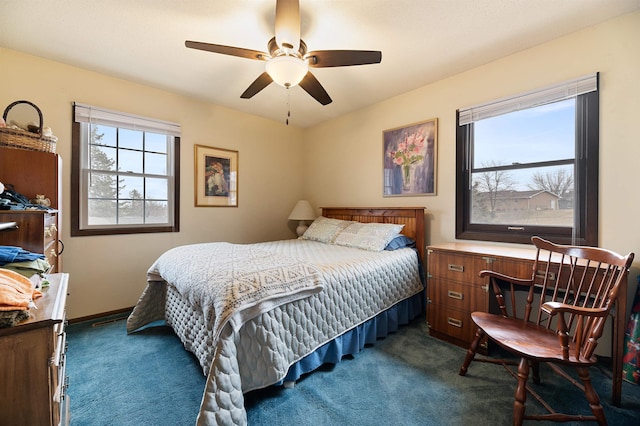 carpeted bedroom featuring ceiling fan