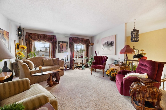 carpeted living room with a textured ceiling