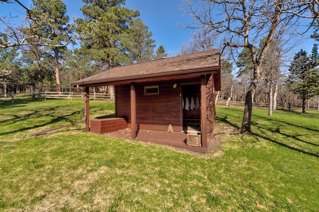 view of outdoor structure with a yard