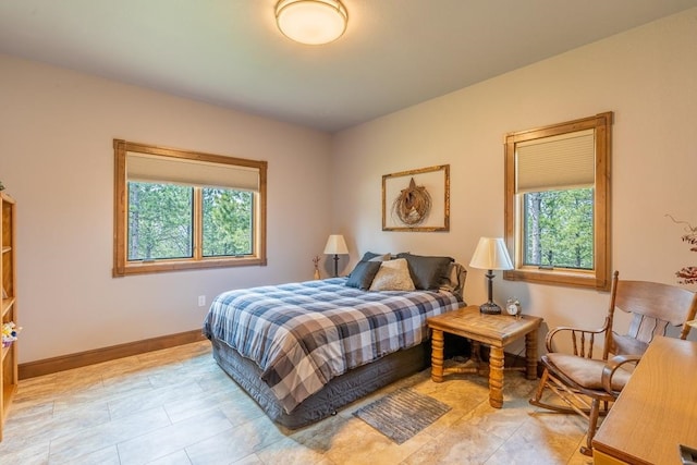 bedroom with light tile floors