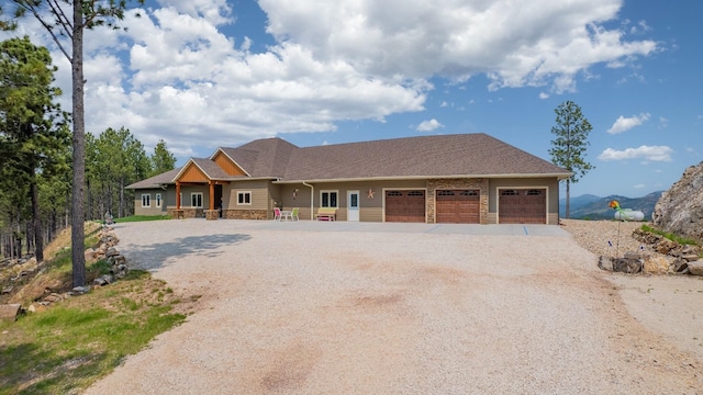 view of front of property with a garage and covered porch