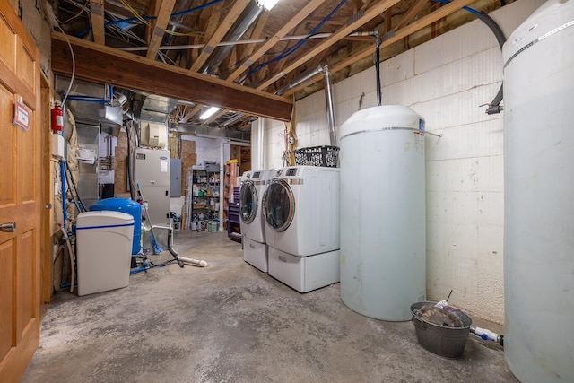 basement with washing machine and dryer and gas water heater