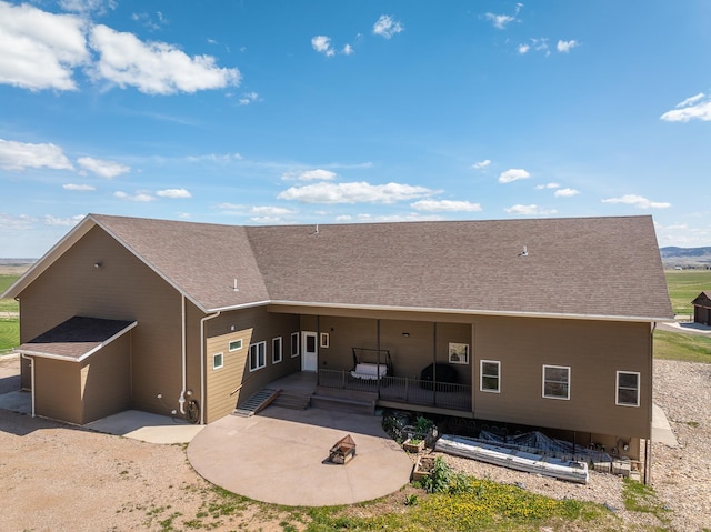 back of house with a patio area