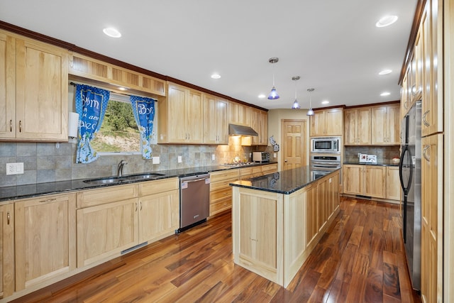 kitchen featuring sink, dark hardwood / wood-style flooring, backsplash, and appliances with stainless steel finishes