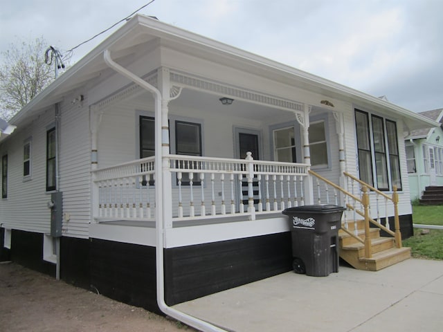 view of home's exterior featuring a porch