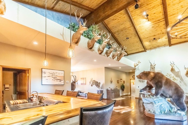 dining space with high vaulted ceiling, wooden ceiling, and beam ceiling