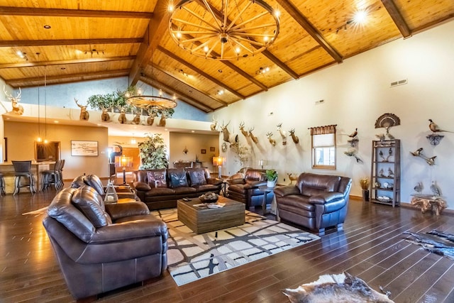 living room featuring high vaulted ceiling, beam ceiling, hardwood / wood-style flooring, and wood ceiling