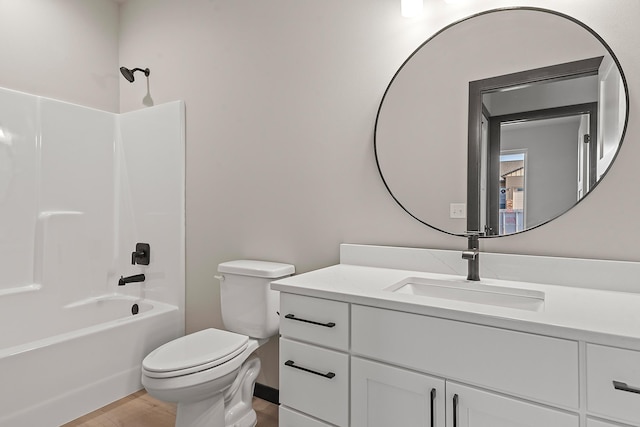 full bathroom with shower / washtub combination, toilet, wood-type flooring, and vanity